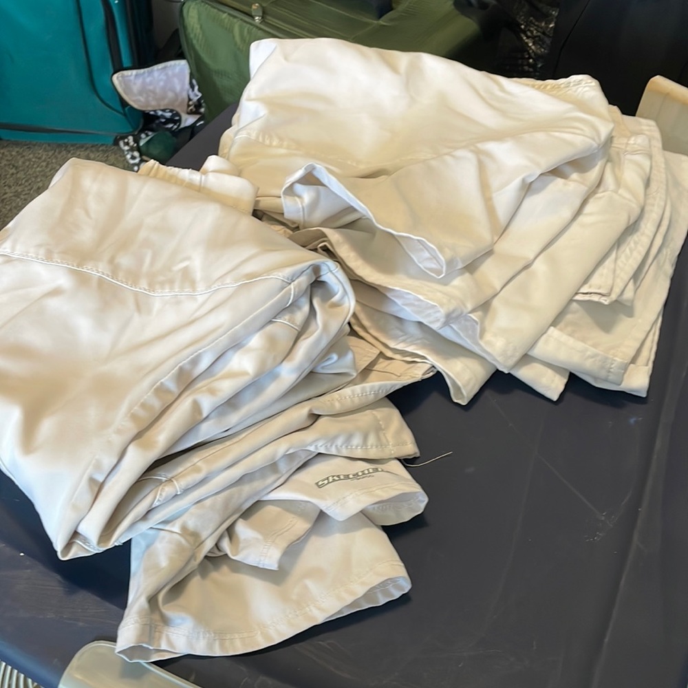 Combo of all white scrub tops.